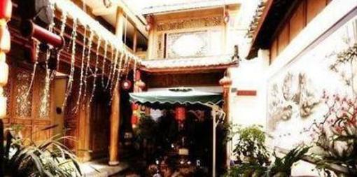 фото отеля Lijiang Happiness Inn