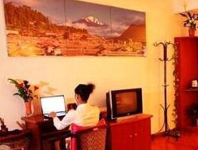 фото отеля Lijiang Wanquan Courtyard B