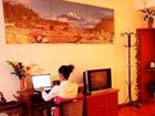 фото отеля Lijiang Wanquan Courtyard B