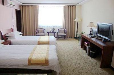 фото отеля Wangjia Business Hotel Gaoxin District Taishan