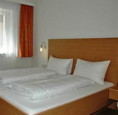 фото отеля Appartements Windschnur