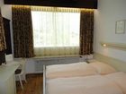 фото отеля Appartements Am Romerweg