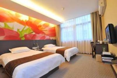 фото отеля Qing Nian Yang Guang Hotel Xing Lin