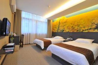 фото отеля Qing Nian Yang Guang Hotel Xing Lin