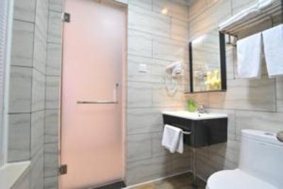 фото отеля Qing Nian Yang Guang Hotel Xing Lin