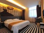 фото отеля Qing Nian Yang Guang Hotel Xing Lin