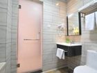 фото отеля Qing Nian Yang Guang Hotel Xing Lin