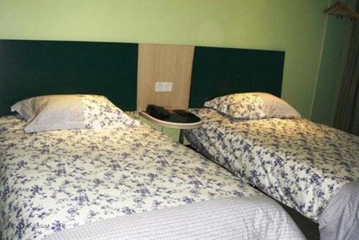 фото отеля Motel 168 Bin Jiang Zhong Road Inn Huangshan