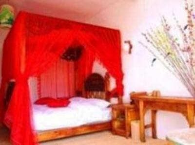 фото отеля Lijiang Jiuwei Life Courtyard Inn