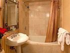 фото отеля Chateau Inn & Suites