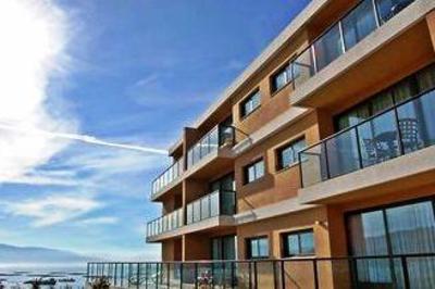 фото отеля Apartamentos Turisticos Playa De Osmo
