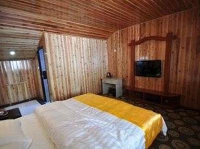 фото отеля Deji Tibetan Inn Jiuzhaigou Valley