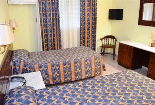 фото отеля Hotel El Pilar La Carlota