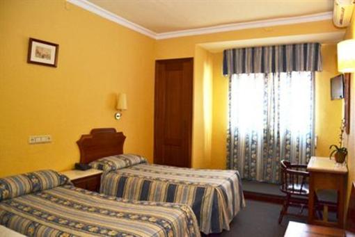 фото отеля Hotel El Pilar La Carlota
