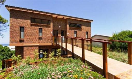 фото отеля Arch Rock Seaside Accommodation