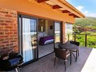 фото отеля Arch Rock Seaside Accommodation