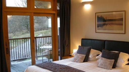 фото отеля Tanglewood Lodge Bed & Breakfast