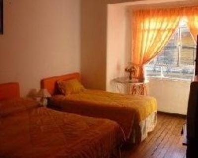 фото отеля Gina's Hostal