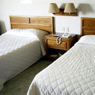 фото отеля Brass Bell Inn and Suites