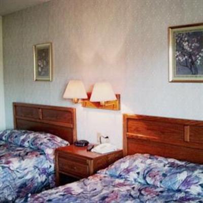 фото отеля Brass Bell Inn and Suites