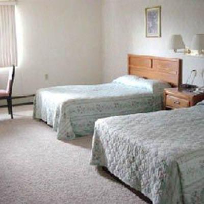 фото отеля Brass Bell Inn and Suites