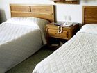 фото отеля Brass Bell Inn and Suites