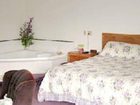 фото отеля Brass Bell Inn and Suites