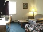 фото отеля Brass Bell Inn and Suites