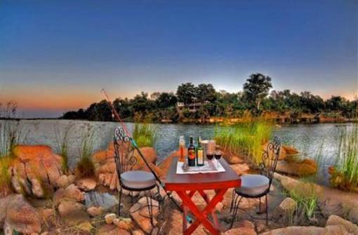 фото отеля Ken River Lodge Panna