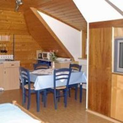фото отеля Ferienwohnungen Käfer Pension