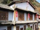 фото отеля Lijiang Qifen Inn