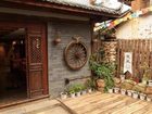 фото отеля Lijiang Qifen Inn