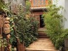 фото отеля Lijiang Qifen Inn