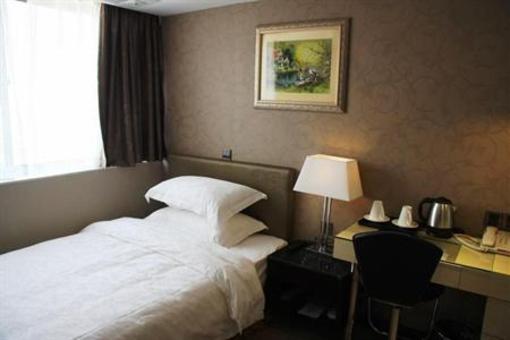 фото отеля Golden Four Seasons Changqing Road