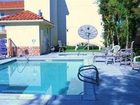 фото отеля GuestHouse International Inn & Suites Pico Rivera