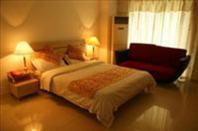 фото отеля Guangna Apartment Hotel