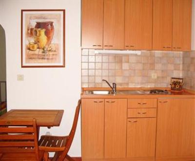 фото отеля Apartments and Rooms Benussi