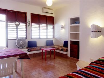 фото отеля La Petite France Vacation Rentals Puerto Morelos