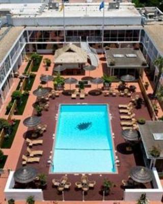 фото отеля El Tropicano Riverwalk Hotel