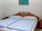 фото отеля Und Ferienwohnungen Pension