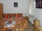 фото отеля Und Ferienwohnungen Pension