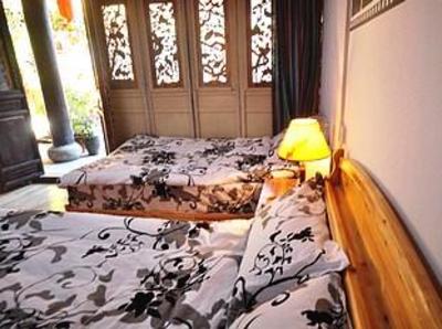 фото отеля Blue Skies Inn - Lijiang