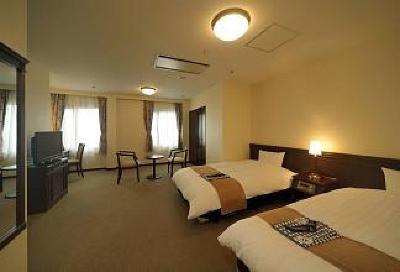 фото отеля Amami Sun Plaza Hotel