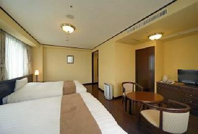 фото отеля Amami Sun Plaza Hotel