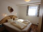 фото отеля Haus Binter Bed and Breakfast Weissensee