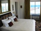 фото отеля Bloubergstrand Sunset Lodge