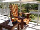фото отеля Bloubergstrand Sunset Lodge