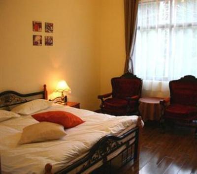 фото отеля Lao Shay Youth Hostel Pingdeng Road
