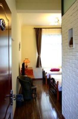 фото отеля Lao Shay Youth Hostel Pingdeng Road