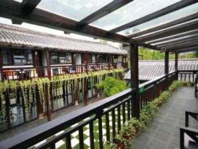 фото отеля Lijiang Shu He San Qian Yuan Inn